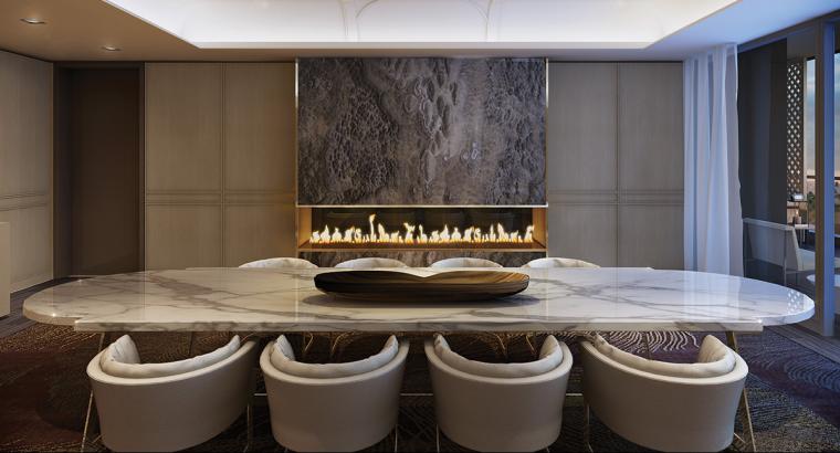 Dining room with granite table and a fireplace is available at Minto Yorkville Park