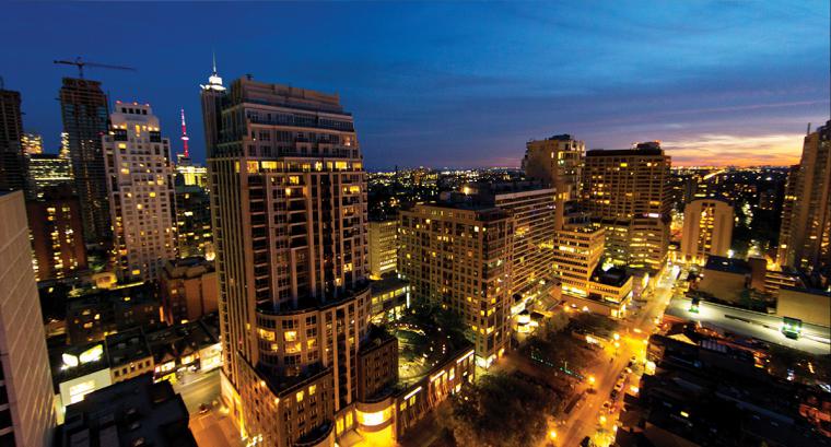 Suites offer a great view of downtown Toronto, close to the CN Tower. Minto Yorkville Park now on sale.