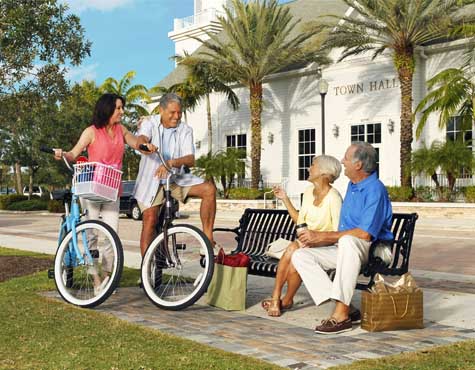 Biking in town at LakePark in Port St. Lucie. Homes now on sale.