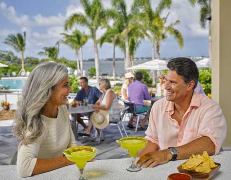 Couple enjoying One Particular Harbour Clubhouse amenities