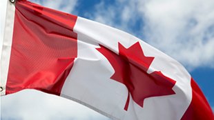 O Canada! The Canadian flag design contest finds a winner and the maple leaf flag
                                                 we know today is created.